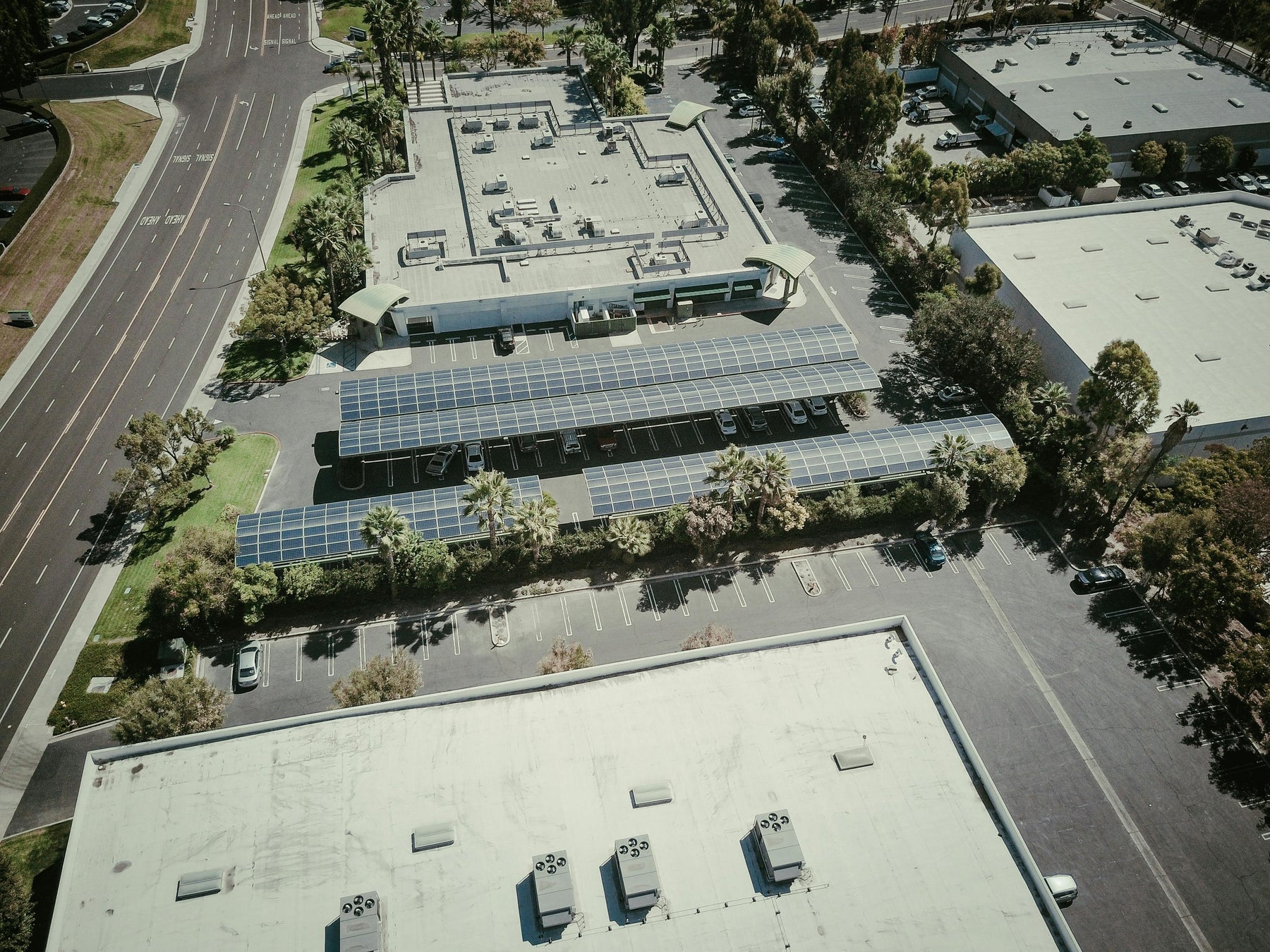 an aerial photo of a parking lot