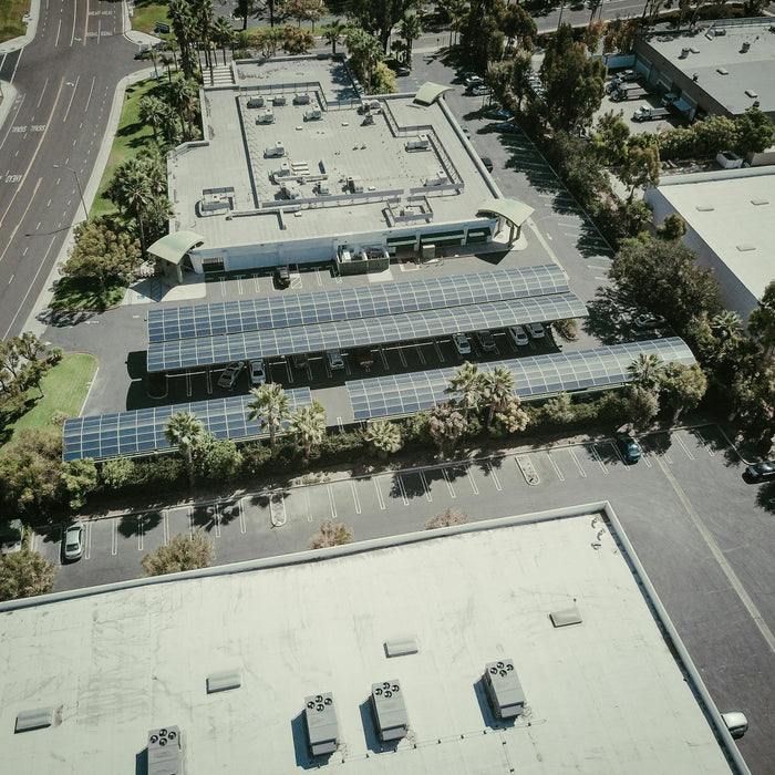an aerial photo of a parking lot