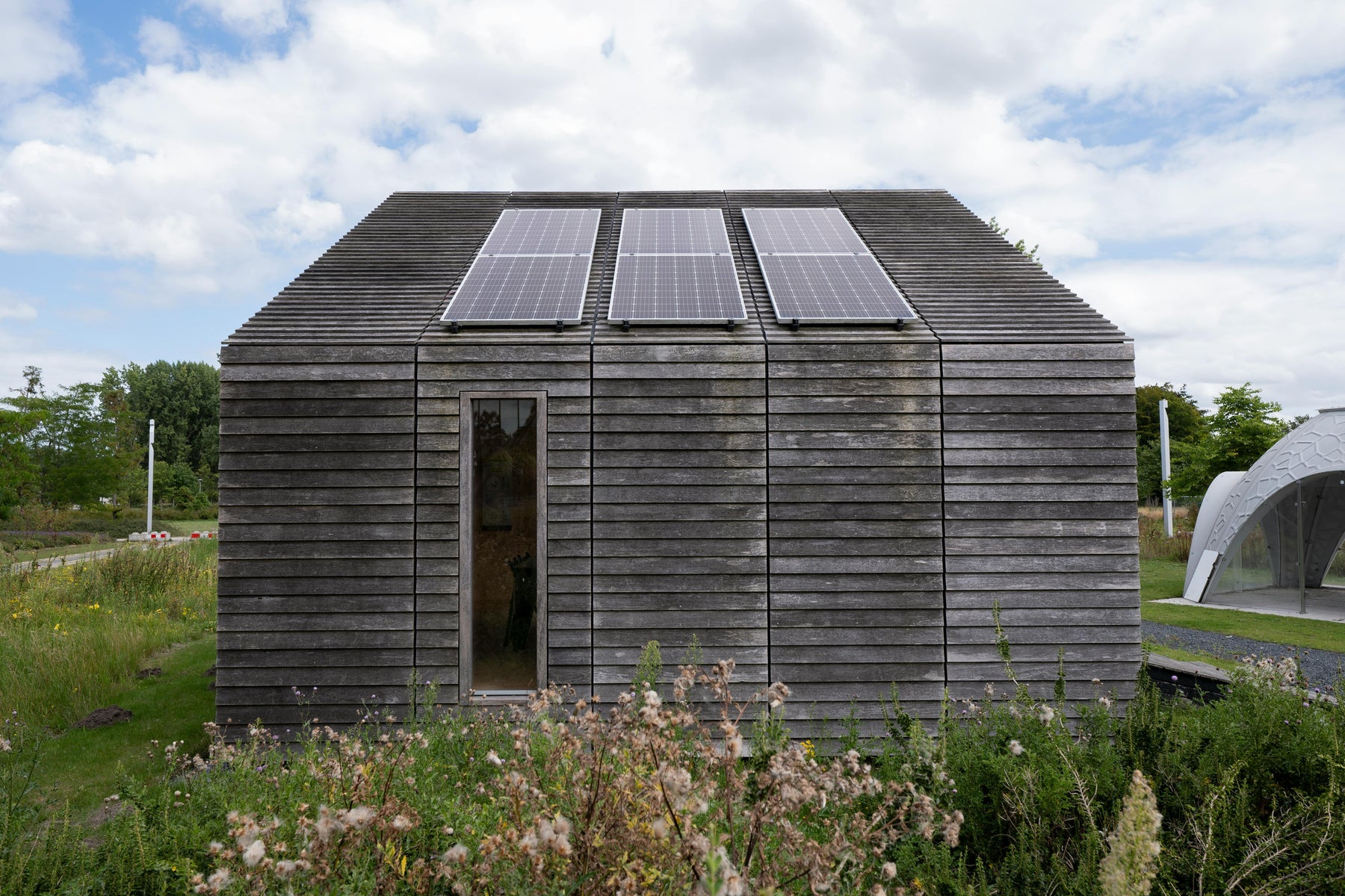a mini beautiful house with solar panels