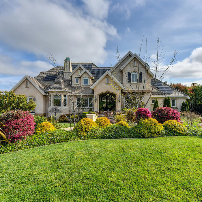 an old fashion house with leased solar panels
