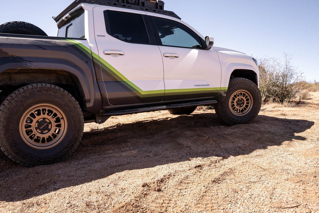 DV8 Offroad | 2024-2026 Toyota Tacoma | Trailing Arm Skid Plates